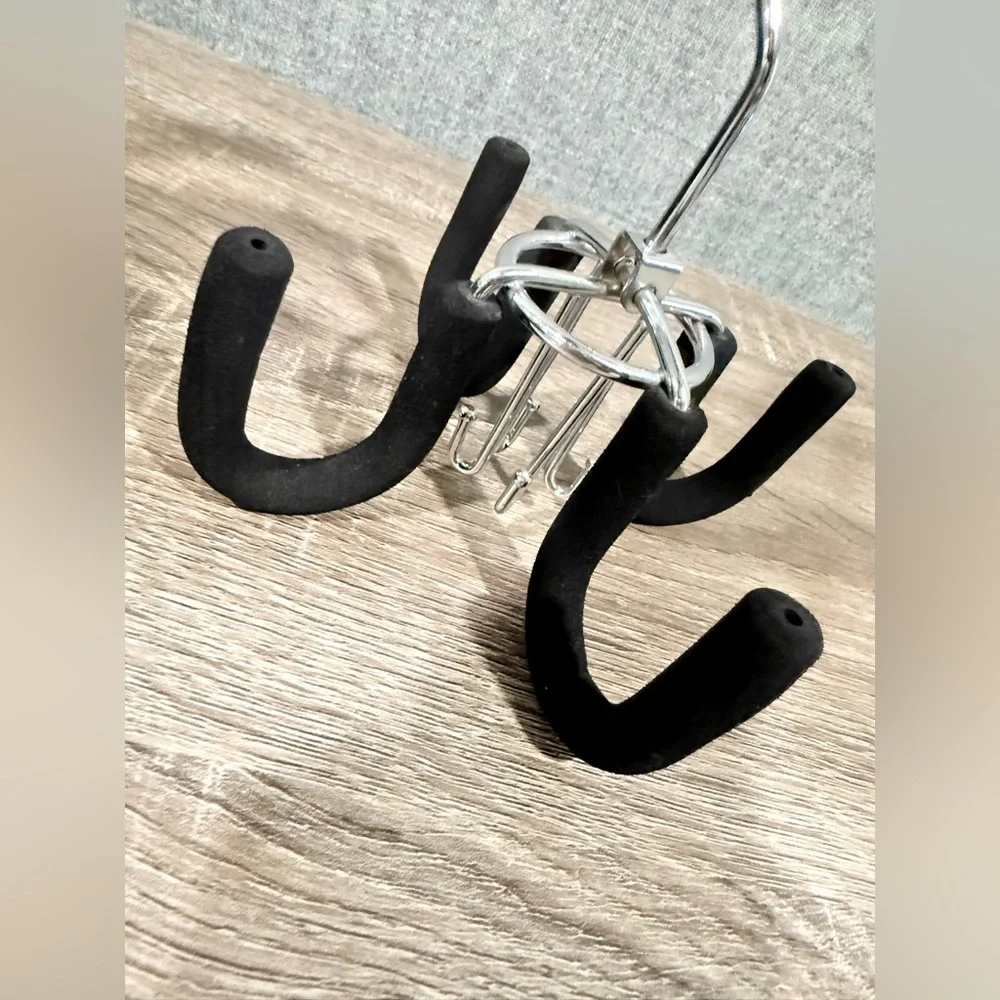 Set of 2, swivel belt hanger. Heavy padded hooks. With 4 small & 4 large hooks